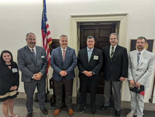 McLean County Farm Bureau member, Eric Kaufman (right)
advocated for farmers on key ag issues as part of the Illinois
Farm Bureau Leaders to DC trip July 11-13. Kaufman and
other farmers from the district discussed the Farm Bill with
Congressman Eric Sorensen, D-17 (third from the left)