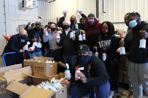 Volunteers at Thornton Township Food Pantry in Harvey, Ill. helped unload more than 300 pounds of frozen ground pork and frozen ground beef donated by McLean County Farm Bureau in partnership with Bloomington Meats.