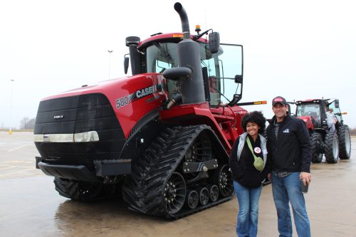 Chay Fisher, Ridgeview High School sophomore (left) had the
chance to test drive a Case IH Quadtrac tractor with McLean
County Farm Bureau board member, Arin Rader, at Acquaintance
Day Jan. 25. Birkey’s Farm Store provided equipment for the event.