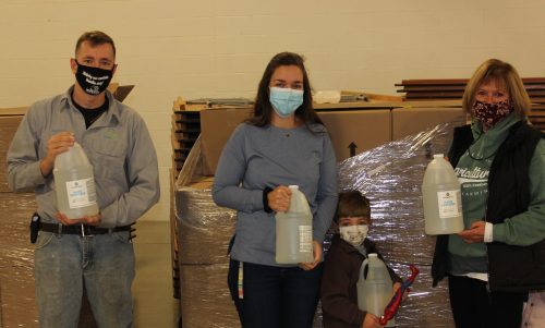 McLean County Ag Education Committee Co-Chairs Austin O’Neall, Carly Rickard, Rollo Rickard and McLean County Ag in the Classroom Coordinator, Bridget Caldwell helped distribute some of the 384 gallons of hand sanitizer to local schools.