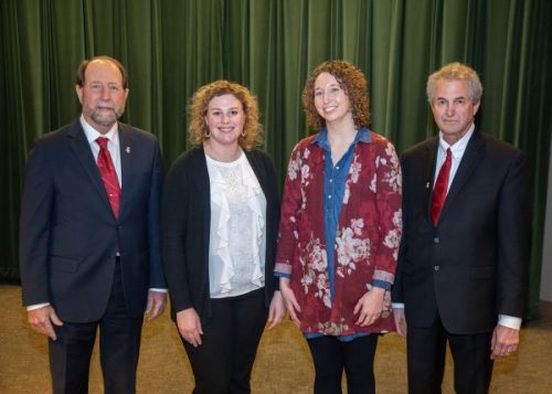 McLean County Farm Bureau members Tori Streitmatter and Kristen Kubsch developed leadership skills and learned about ag issues in the Illinois Farm Bureau Agricultural Leaders of Tomorrow (ALOT) program. Pictured (from left): Steve Stallman, IAA District 16 Director; Streitmatter; Kubsch; and Randy Poskin, IAA District 6 Director.